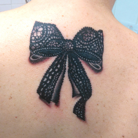 lace bow tattoo